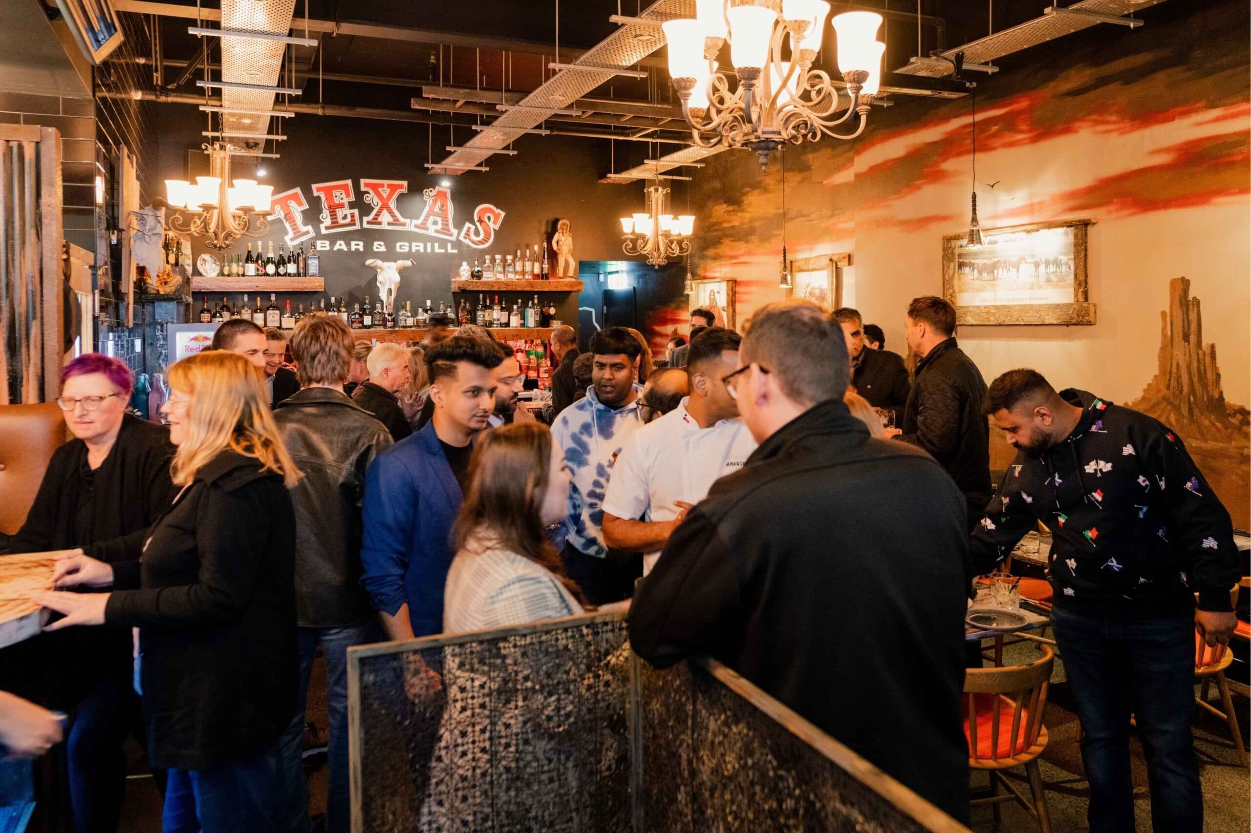 Guests dining at the Texas Bar & Grill venue